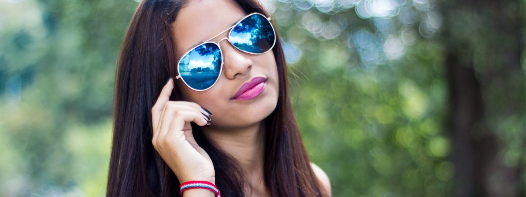 Girl-Blue-Tinted-Sunglasses-1280x480-1024x384-1