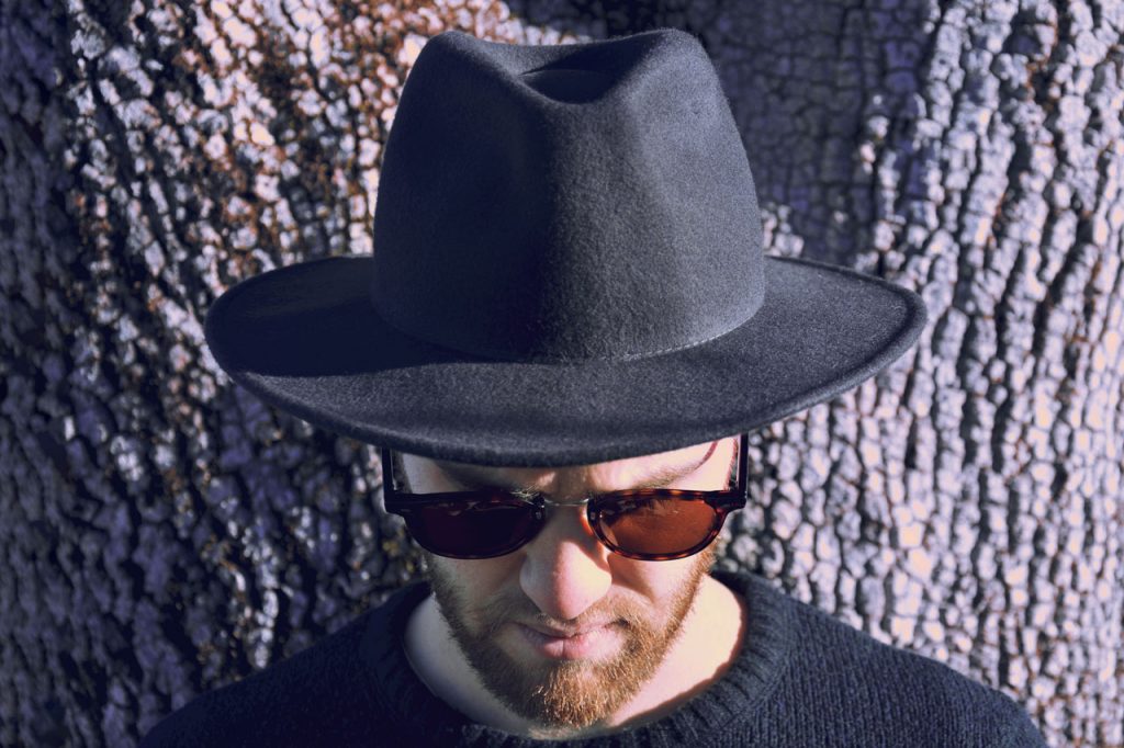 hero-man-hat-glasses-1280-1024x682-1