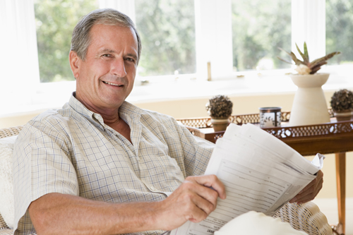 man_reading_newspaper