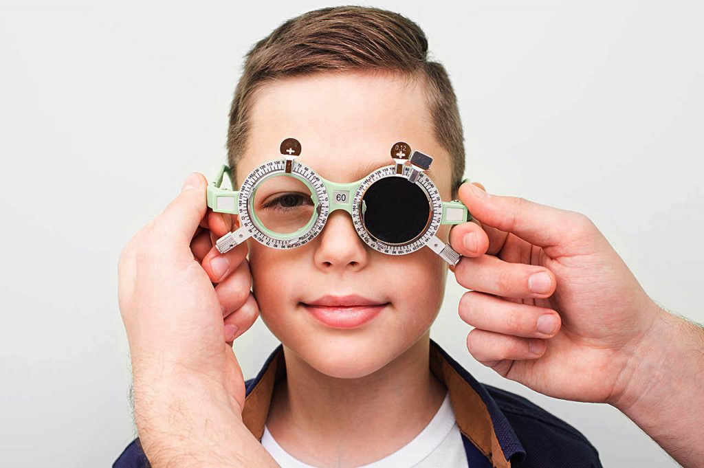 Optometrist-Putting-On-The-Boy_1280x853-2-1024x681-1