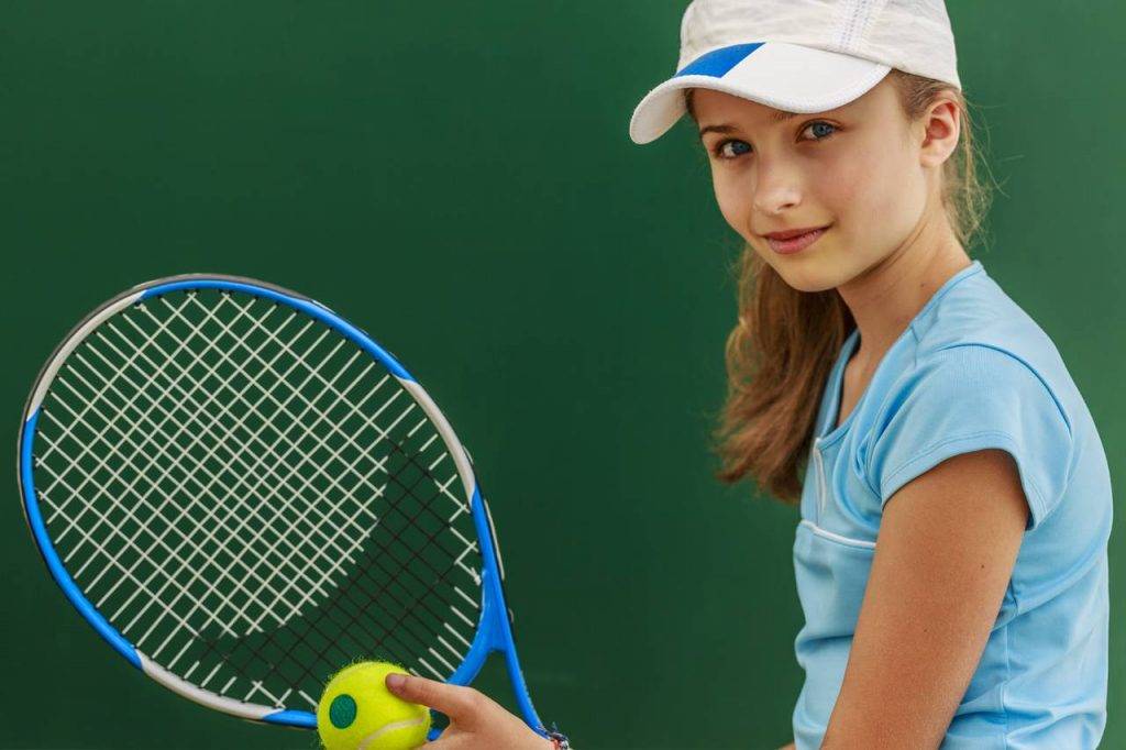 Young-Girl-Tennis-Racket-1280x853-1024x682-1
